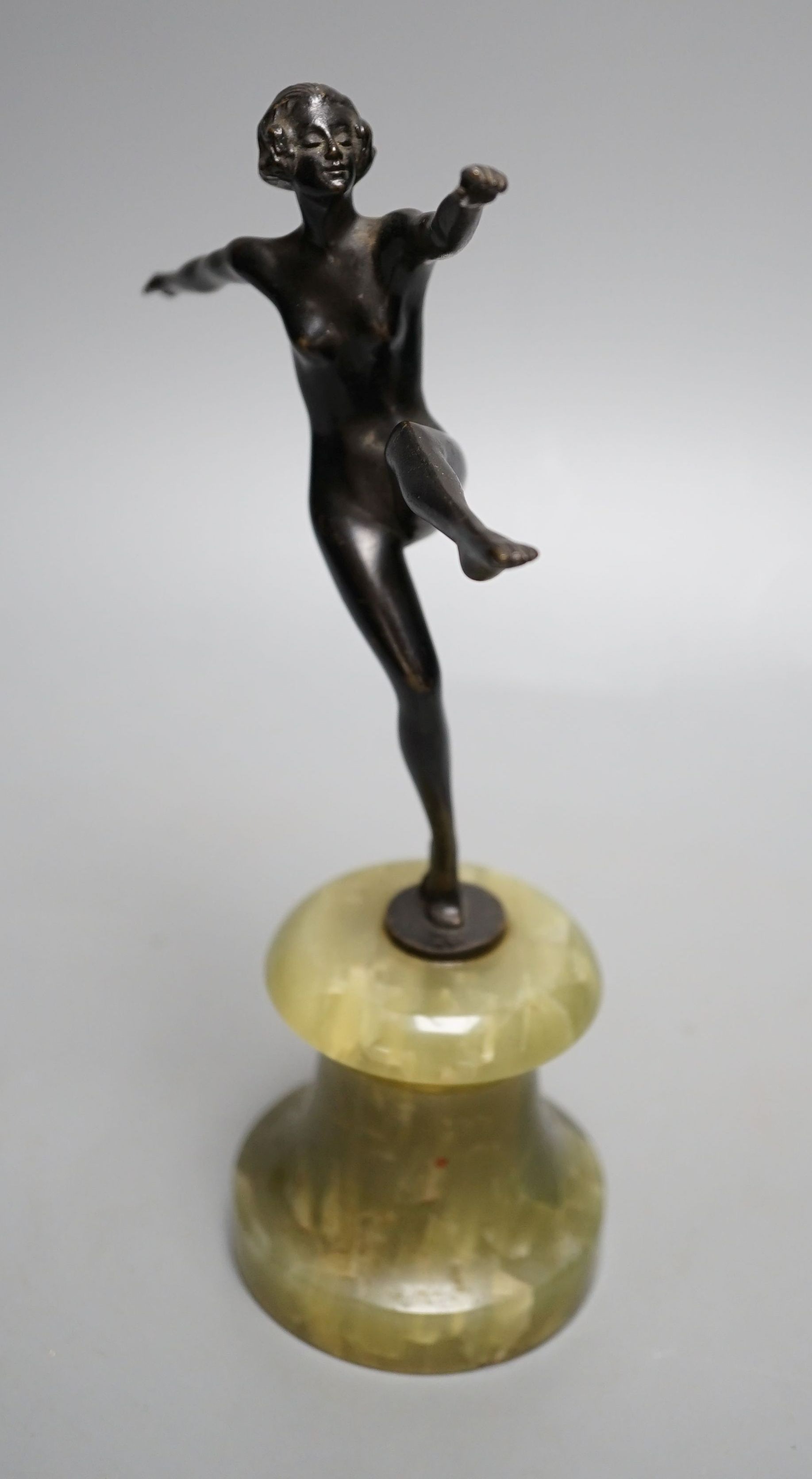 An Art Deco bronze figure of a nude dancer on onyx base - 22cm tall